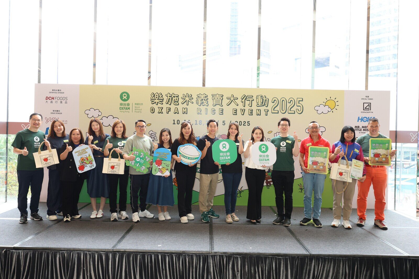 (From left) Henry Tang, Director of Operations of Oxfam Hong Kong; Kennis Wong, Human Resources & Administration Manager of Concept 4; Karen Lau, Head of Marketing and Communication, Zurich Insurance (Hong Kong); Maggie Sze, Marketing Director of TamJai SamGor Mixian; Betty Pun, Director General of Oxfam Hong Kong; Johnson Ma, Chief Licensing Officer of Medialink Animation International Limited; Gian Chan, Associate Director of Sanrio Global Asia Limited; Ivy Yeung, Director and Head of Consumer Division of Dah Chong Hong Holdings; celebrity athlete Rex Tso; celebrity Snow Suen; Connie Cheung, General Manager of OpenRice Limited; Hugh Kam, Council Vice Chair Chairperson of Oxfam Hong Kong; Joseph Lau, Head of Corporate Communications of Dah Chong Hong Holding; Pamela Lin, PX, CSR & Office Manager of Deckers Brands and Michael Wong, Fundraising and Communications Director of Oxfam Hong Kong all supporting this year's Oxfam Rice Event as it approaches its 30th anniversary.