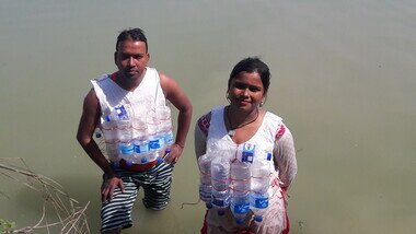 Apart from having boats, a trained task force and first aid responders, and a community based early warning system, this low-cost life jacket made of plastic bottles and jute also plays a major part in flood-prone communities’ disaster preparedness. (Photo: Oxfam)