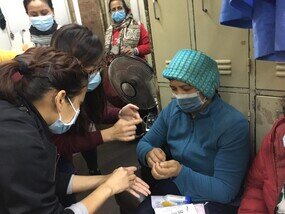 The Nepali translator showed cleaners how to wash their hands properly.