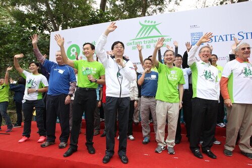 Oxfam Trailwalker Kick-Off Ceremony being held at 11am today and was officiated by (from left) Ms. Yu Chui Yee, Paralympics Wheelchair Fencing Gold Medalist, Mr. Thomas Lynch, Senior Vice President, Head of Enterprise Risk Management, Asia Pacific, State Street Corporation, Mr. Bernard Chan, Chairman, Oxfam Trailwalker Advisory Committee, Dr. Ko Wing-man, BBS, JP, Secretary for Food and Health, Dr. Stephen Fisher, Director General, Oxfam Hong Kong, Dr. Lo Chi Kin, J.P., Chair, Oxfam Hong Kong Council and Mr. David Hodson, member of Oxfam Hong Kong Council.